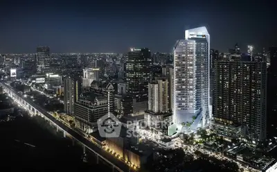 Stunning night view of a modern high-rise building in a bustling cityscape.