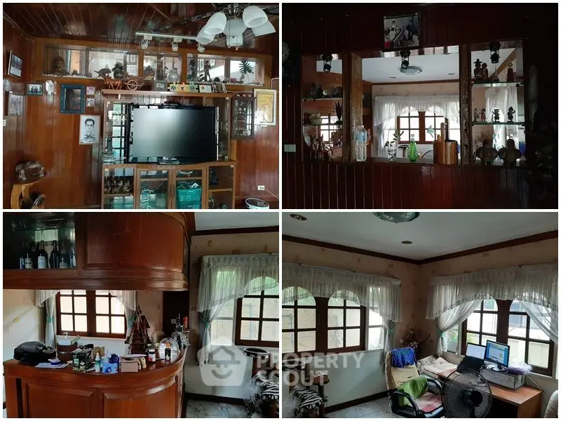 Charming wooden interior with cozy living and study areas, featuring classic decor and natural light.