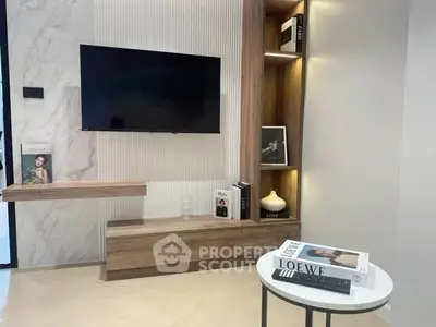 Modern living room with sleek TV setup and stylish decor