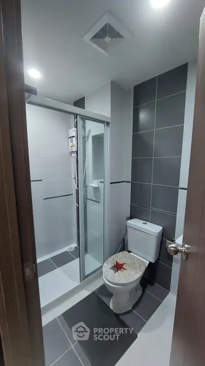 Modern bathroom with sleek shower and stylish tile design