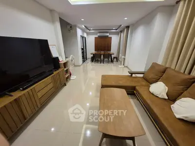 Spacious modern living room with sleek furniture and open layout