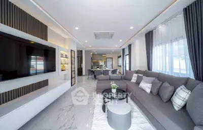Spacious modern living room with elegant decor and large sectional sofa