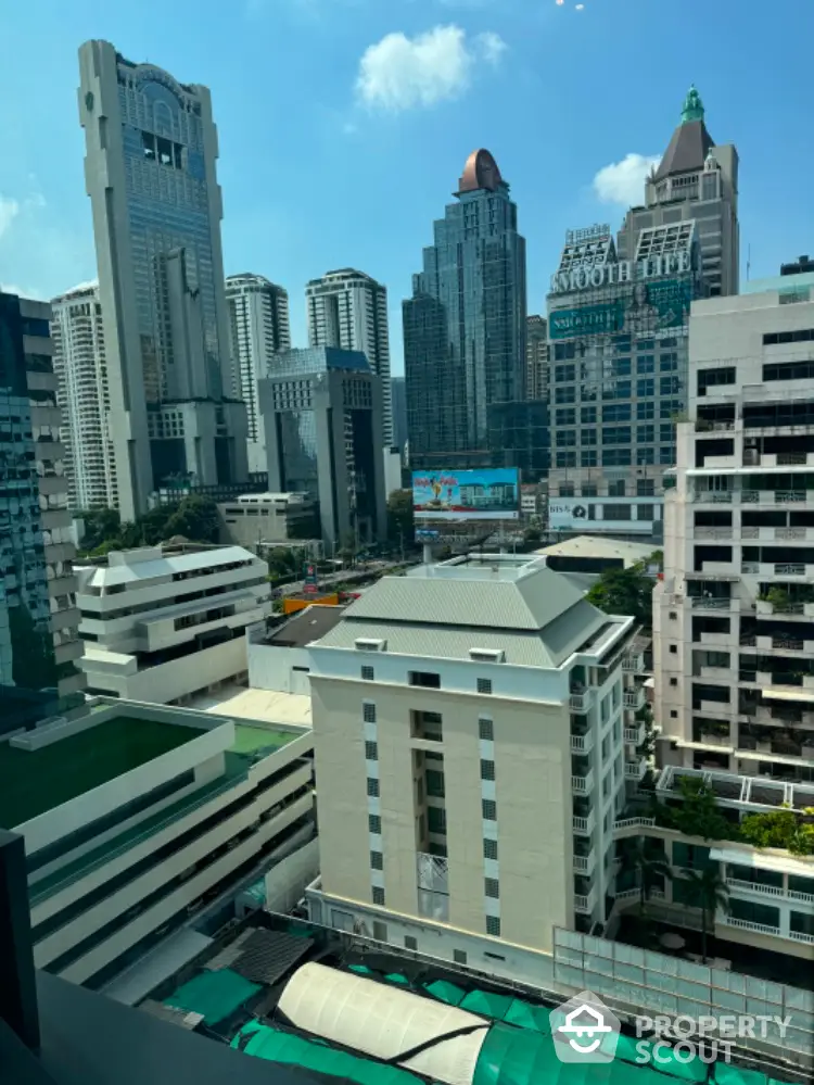 Stunning cityscape view from high-rise building showcasing modern architecture and skyline.