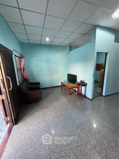 Spacious living room with modern furniture and natural light