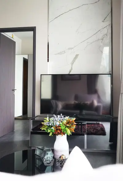 Modern living room with sleek TV setup and elegant decor