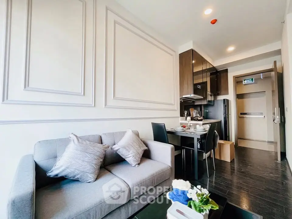 Modern living room with sleek kitchen in open layout apartment