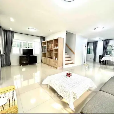 Spacious modern living room with elegant decor and natural light