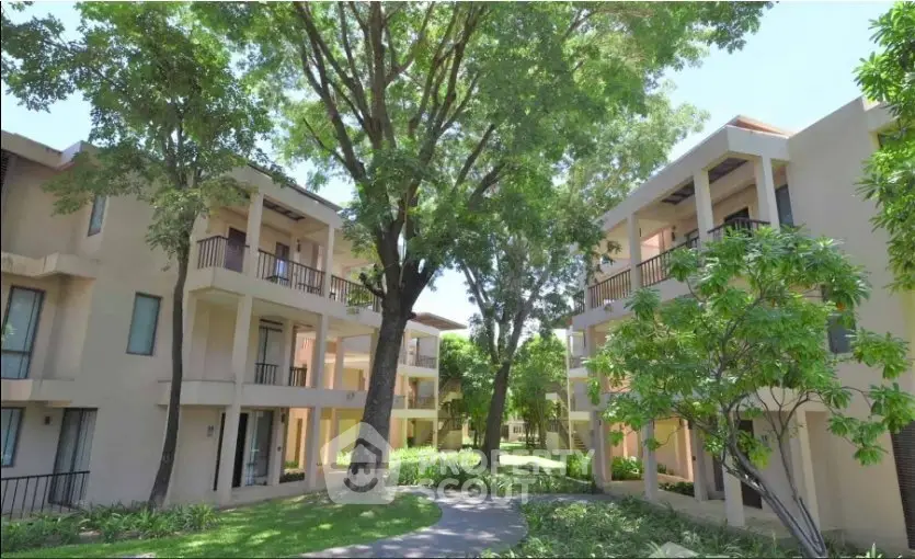 Charming residential complex with lush greenery and modern architecture