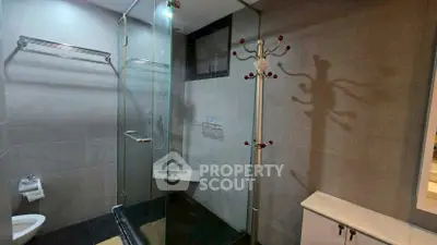 Modern bathroom with glass shower and sleek design