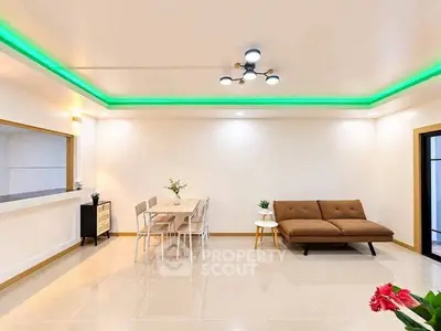 Spacious modern living room with stylish lighting and elegant furniture