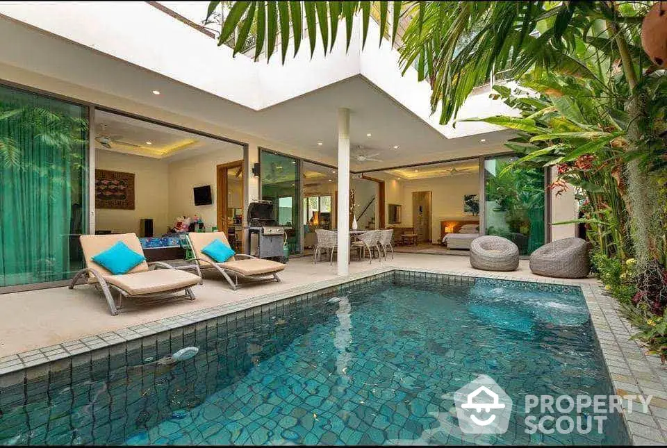 Luxurious villa with private pool and lush garden, perfect for relaxation and entertaining.