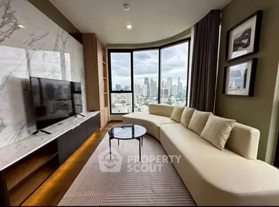 Luxurious living room with panoramic city view, modern furnishings, and elegant marble accents.