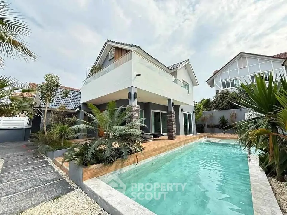 Stunning modern villa with private pool and lush garden, perfect for luxury living.