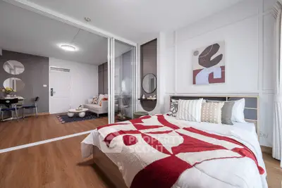 Modern bedroom with stylish decor and open layout in a contemporary apartment