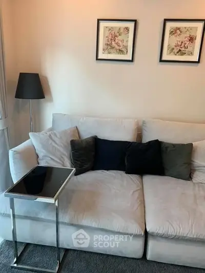Cozy living room with plush sofa and elegant decor