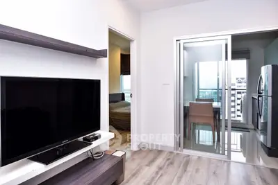 Modern apartment interior with sleek living room and kitchen area