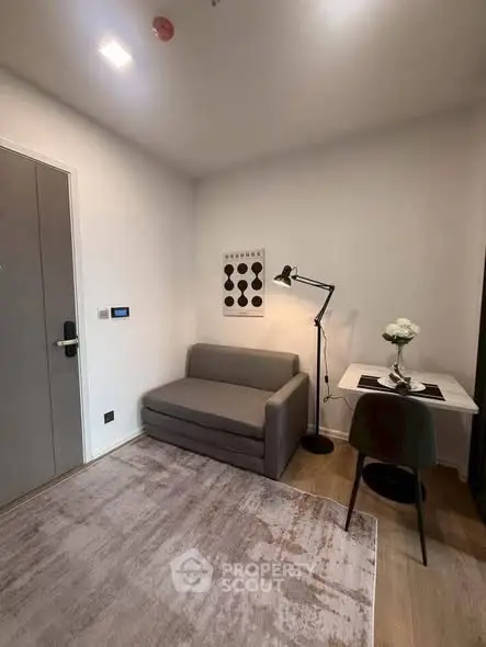 Cozy modern living room with stylish sofa and workspace