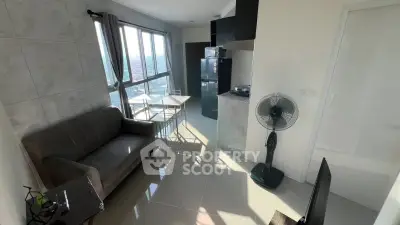 Modern apartment living room with city view, sleek furniture, and natural light.
