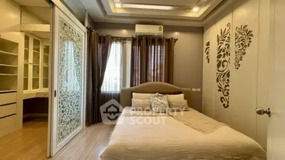 Elegant bedroom with stylish decor and ample storage space