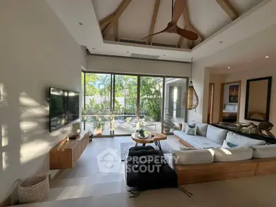 Luxurious living room with modern decor and garden view