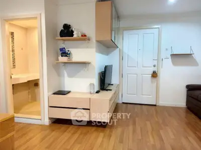 Modern living room with wooden flooring and minimalist decor