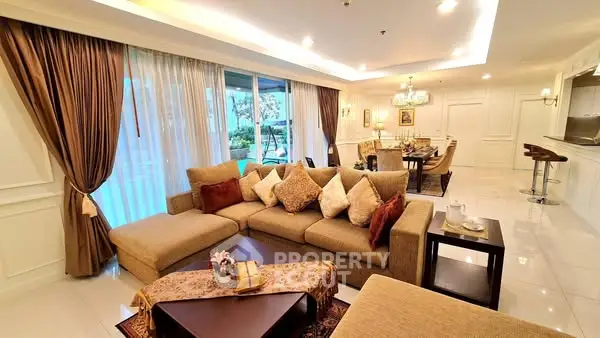 Luxurious living room with elegant decor and spacious seating area, perfect for relaxation and entertaining.