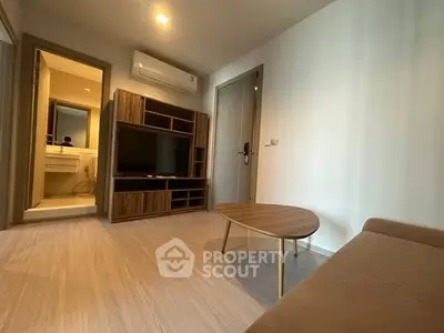 Modern living room with stylish furniture and air conditioning, perfect for cozy urban living.