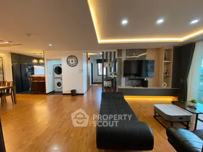 Spacious modern living room with open layout and stylish decor