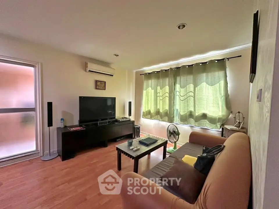 Cozy living room with modern furnishings and natural light