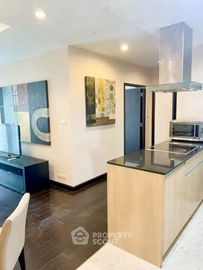 Modern open-layout kitchen with sleek design and contemporary decor