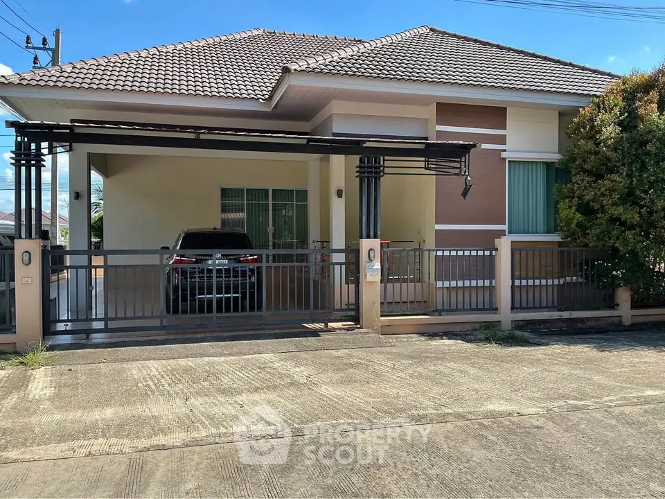 Charming single-story house with carport and modern facade in a serene neighborhood.