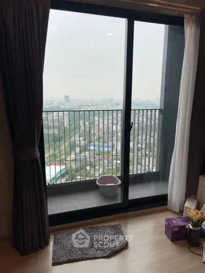 Spacious balcony with stunning city view from high-rise apartment