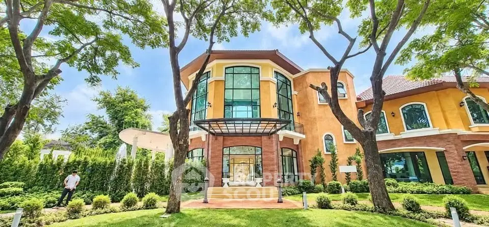 Stunning luxury villa with lush garden and modern architecture, perfect for upscale living.