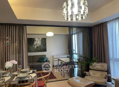 Stylish living room with modern furniture and elegant lighting in a cozy apartment.