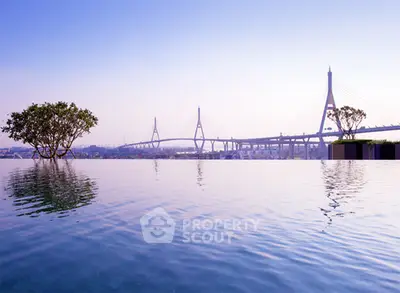 Stunning infinity pool with breathtaking bridge view, perfect for luxury living.