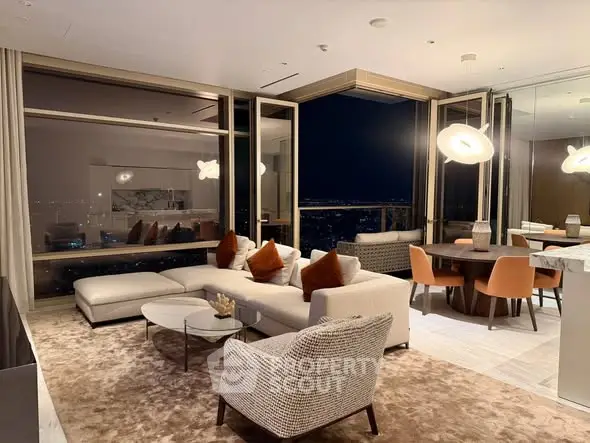 Luxurious modern living room with stunning night city view, elegant furniture, and ambient lighting.