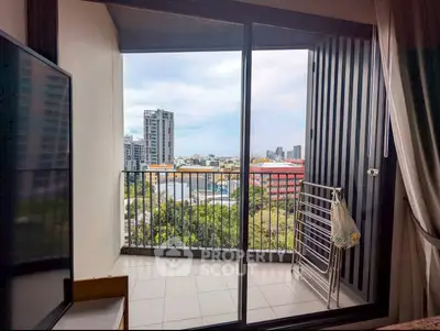Spacious balcony with stunning city view, perfect for relaxation and enjoying the skyline.