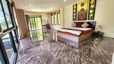 Luxurious bedroom with stunning marble flooring and large windows