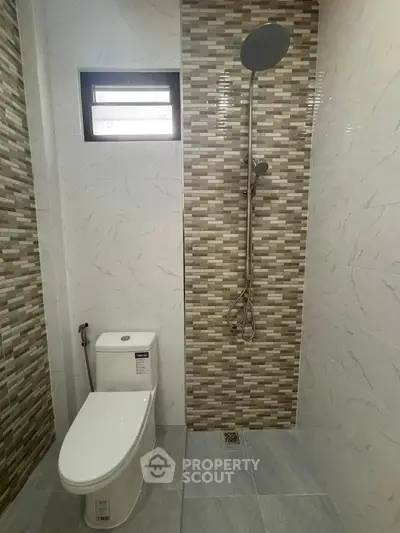 Modern bathroom with sleek shower and stylish tile design
