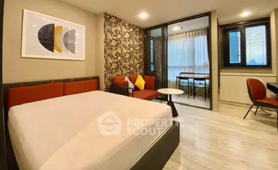 Modern bedroom with stylish decor and spacious layout in urban apartment