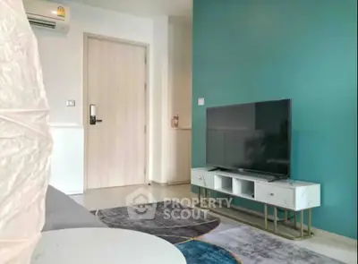 Modern living room with stylish TV stand and vibrant accent wall