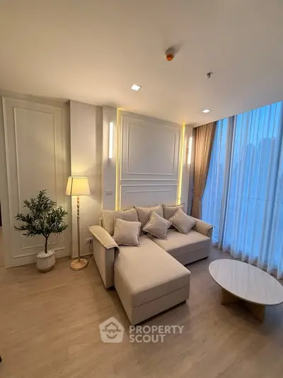 Luxurious living room with elegant decor and stunning city view