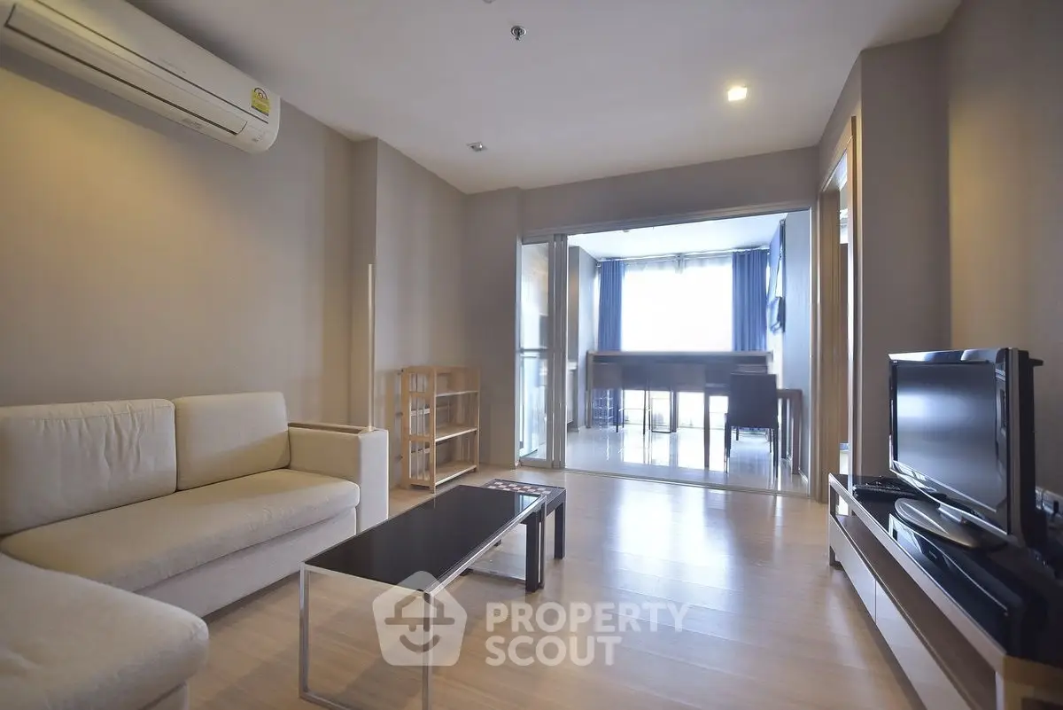 Modern living room with sleek furniture and natural light