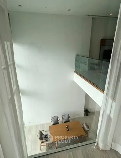 Modern loft with high ceiling and stylish dining area