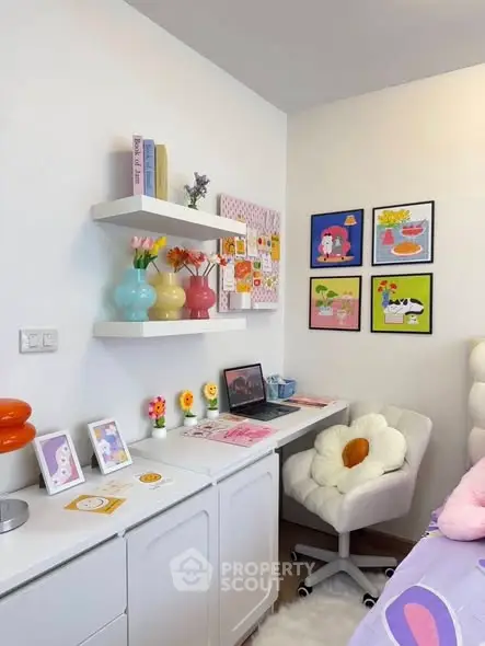 Charming study room with colorful decor and cozy seating, perfect for creativity and productivity.
