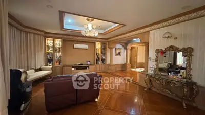Luxurious living room with elegant wood flooring and classic decor