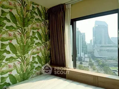 Stylish bedroom with tropical wallpaper and stunning city view