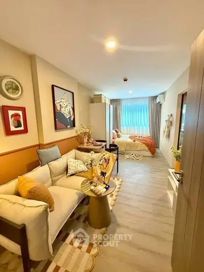 Charming studio apartment with cozy living area and stylish decor