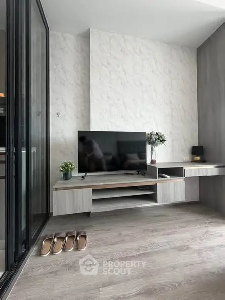 Modern living room with sleek TV unit and stylish decor
