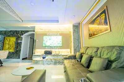 Luxurious living room with modern decor and elegant lighting